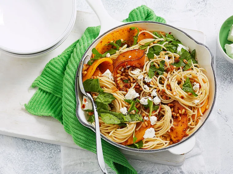 Pumpkin pasta with feta, pine nuts and rocket