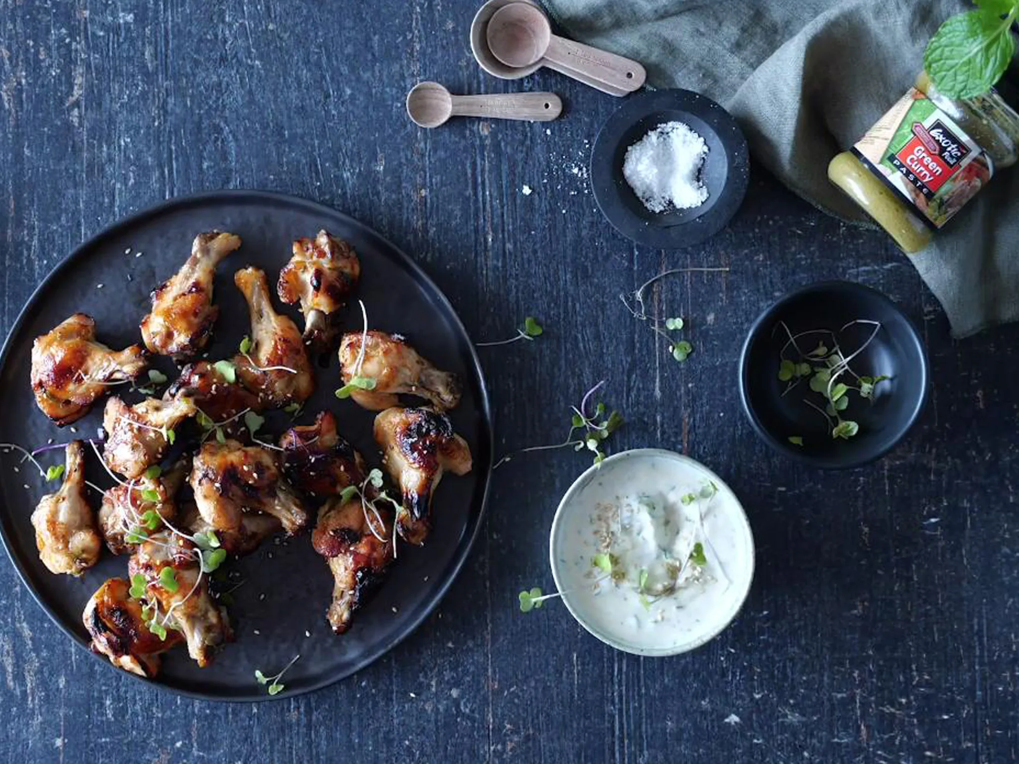 Curry yoghurt dip with sticky chicken nibbles