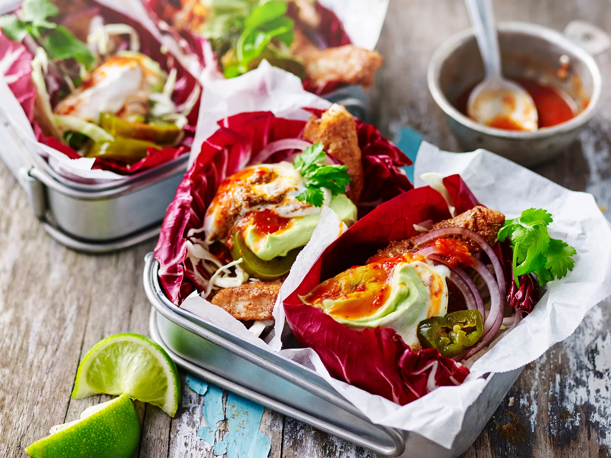 Jerk fish with slaw and harissa yoghurt