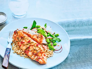 Lime and chilli-glazed fish with salad and brown rice
