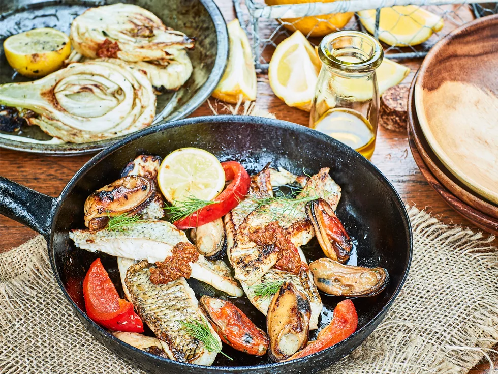 Crispy-skinned fish with harissa dressing