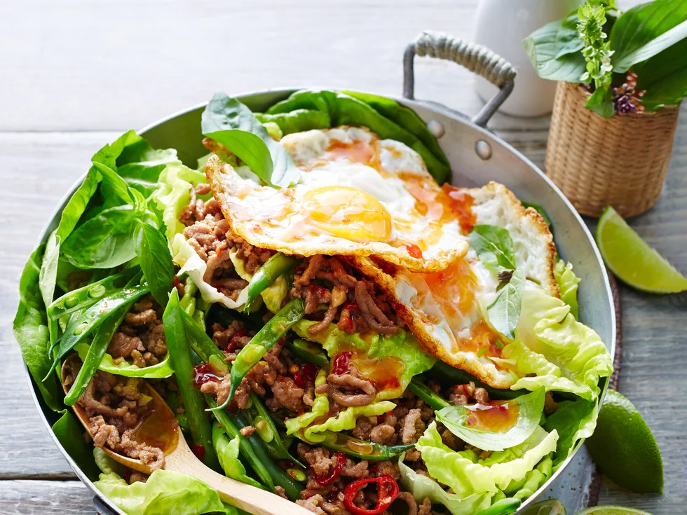 Stir-fry turkey with basil and fried egg