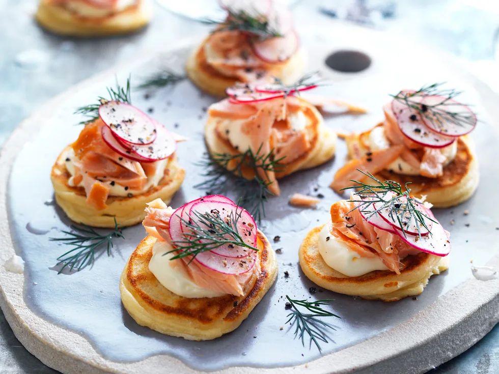 Spelt blini with hot-smoked salmon and crème fraîche