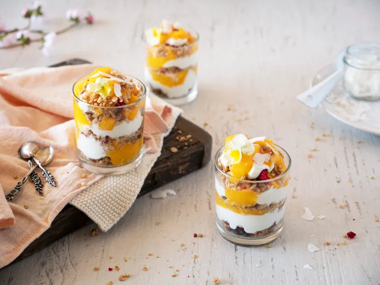 Mango and coconut protein yoghurt granola parfait