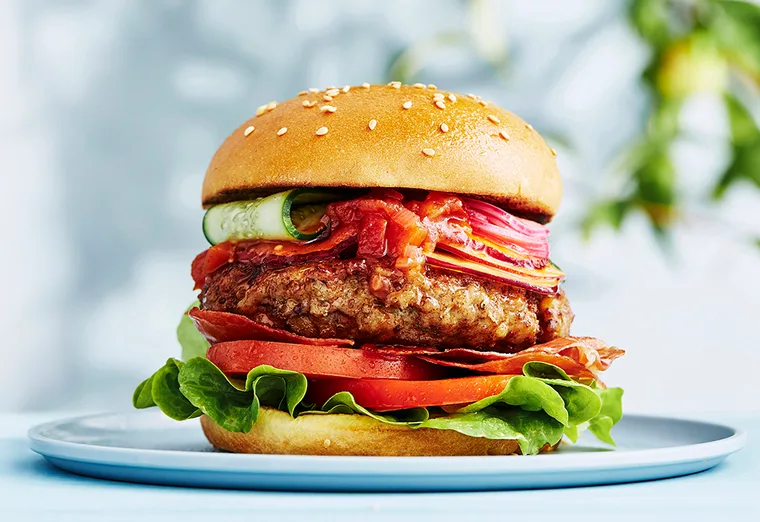 NZ Pork burger with peach & red onion pickles