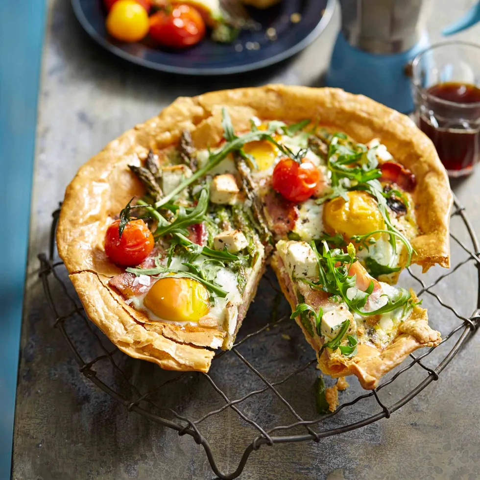 Breakfast tart with eggs, feta, rocket and cherry tomatoes