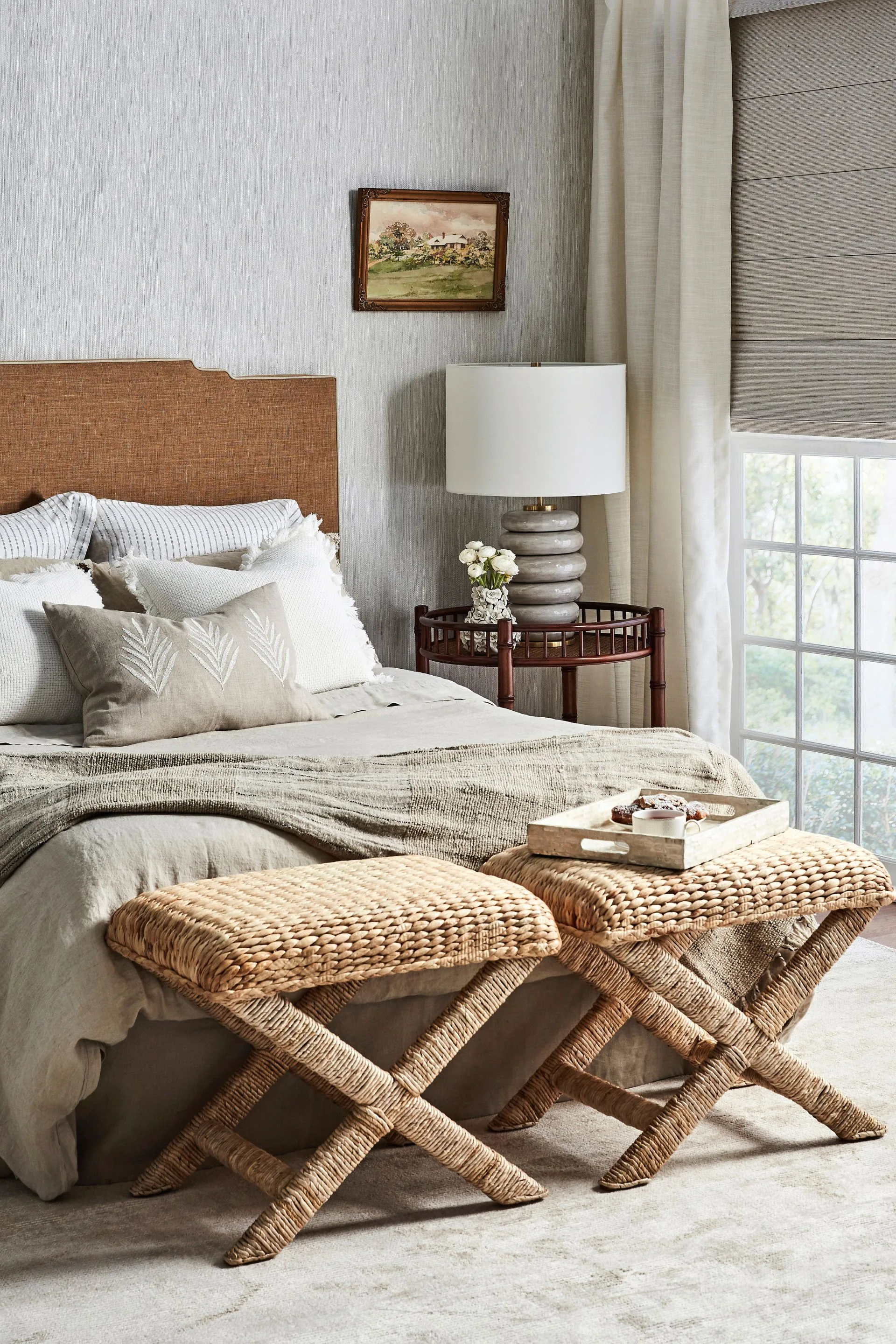 bedroom with made bed and neutral coluors