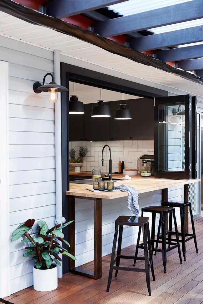 Small kitchen with servery window