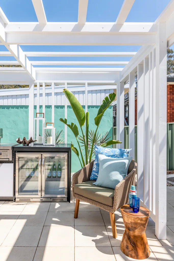 pergola in palm spring style with outdoor kitchen inside