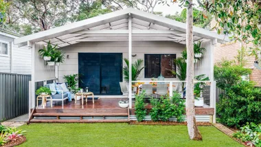 Patio makeover with couch, outdoor dining area and garden