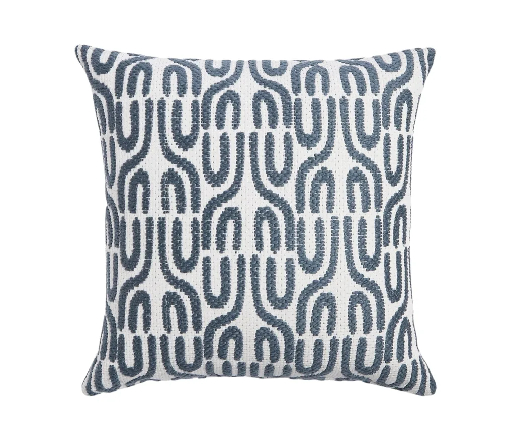navy blue pillow with woven designs