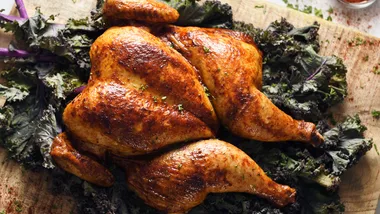 spatchcock chicken on chopping board