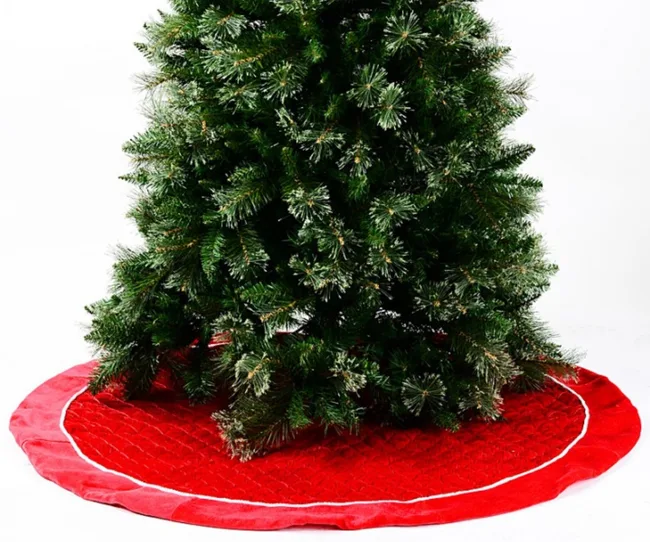 red traditional christmas tree skirt with tree on it