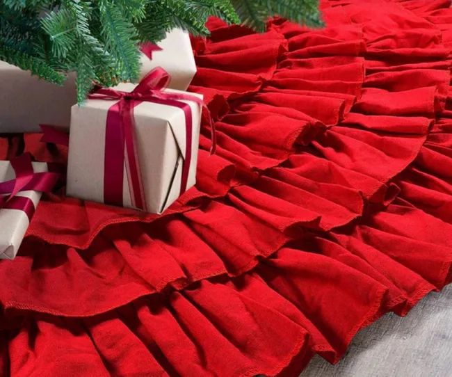 ruffled red christmas tree collar with wrapped present on top