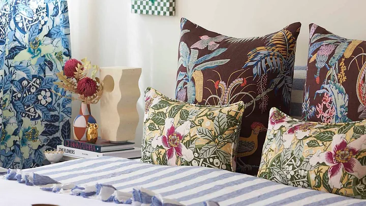 Modern bedroom with a combinatin of striped and floral bedding