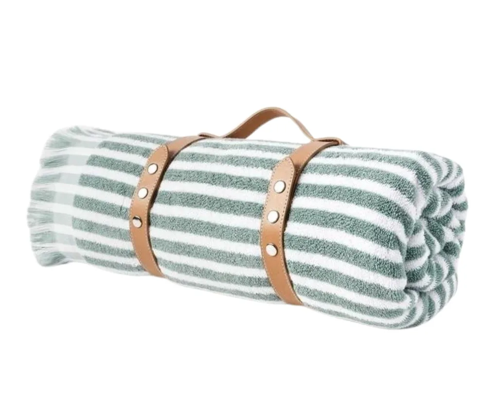 pinstripe beach towel in sage with a leather carry strap