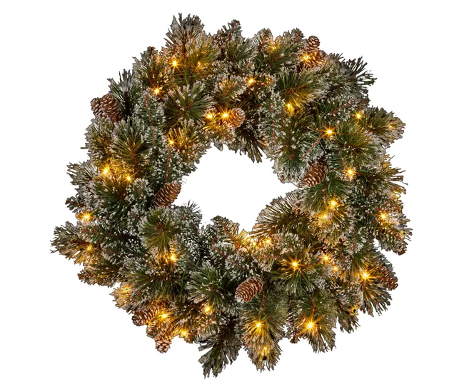 christmas wreath with muted green colour and yellow homey lights in it