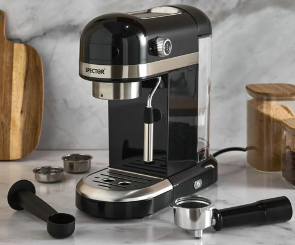 coffee machine in black with included accessories sitting around it on marble benchtop