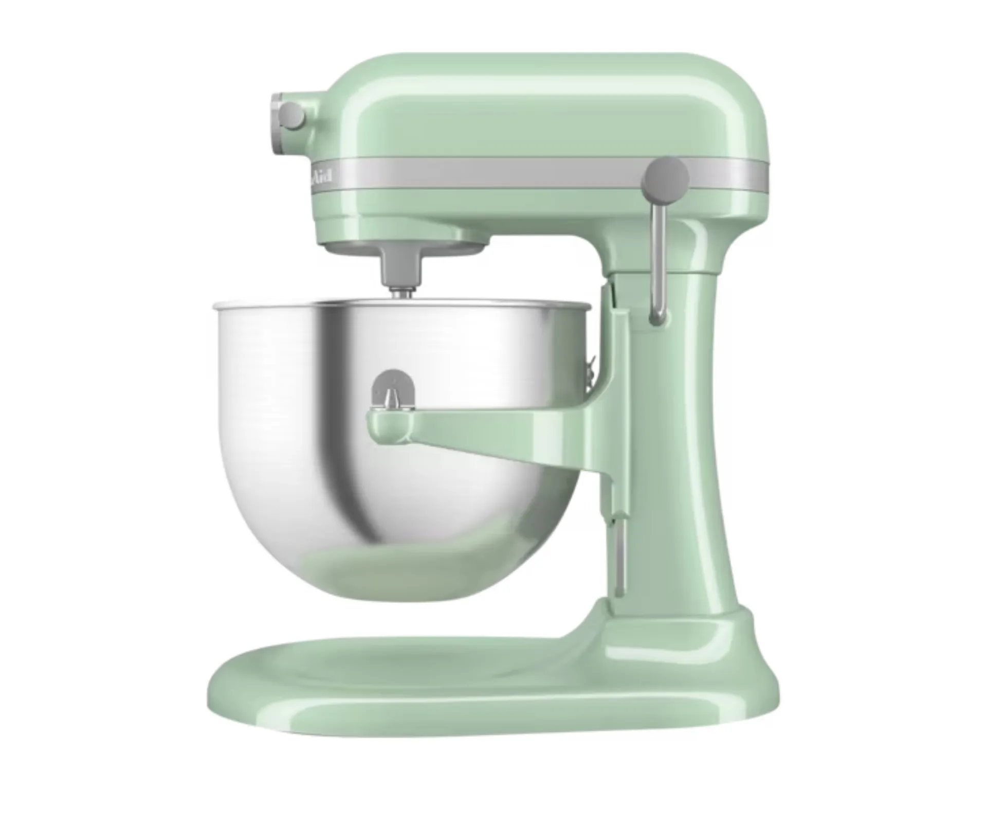 light pastel green stand mixer photographed on it's side with silver bowl