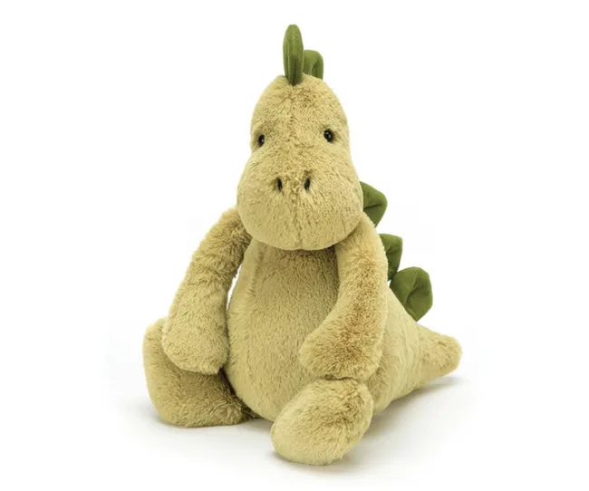 fluffy plush dinosaur toy in light green