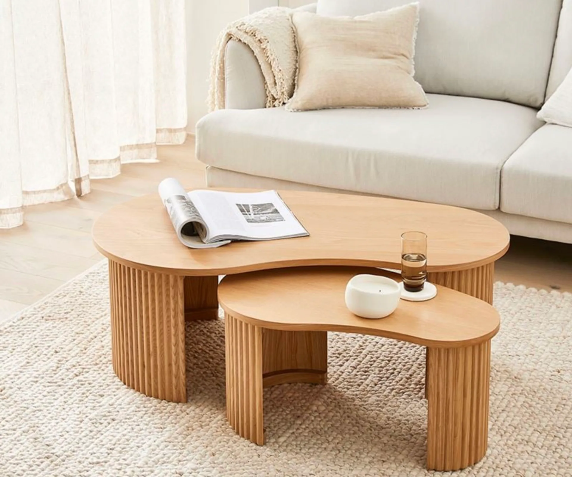 Adairs has a mix of affordable and high quality furniture and homeware, like this wooden nesting coffee table set by Mark Tuckey.