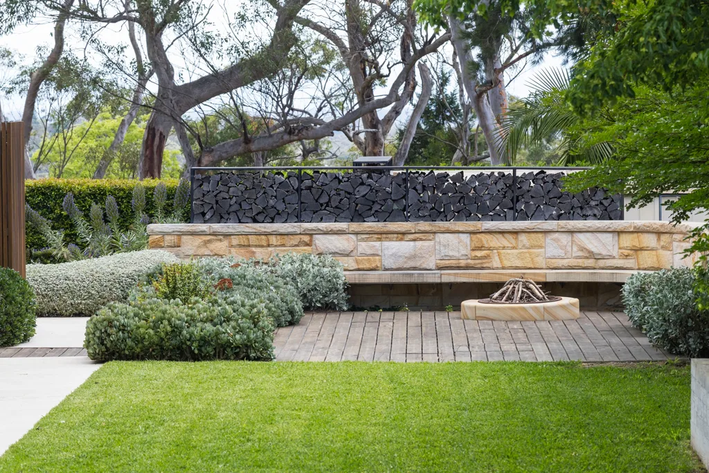 mediterranean garden with sandstone and wooden deck