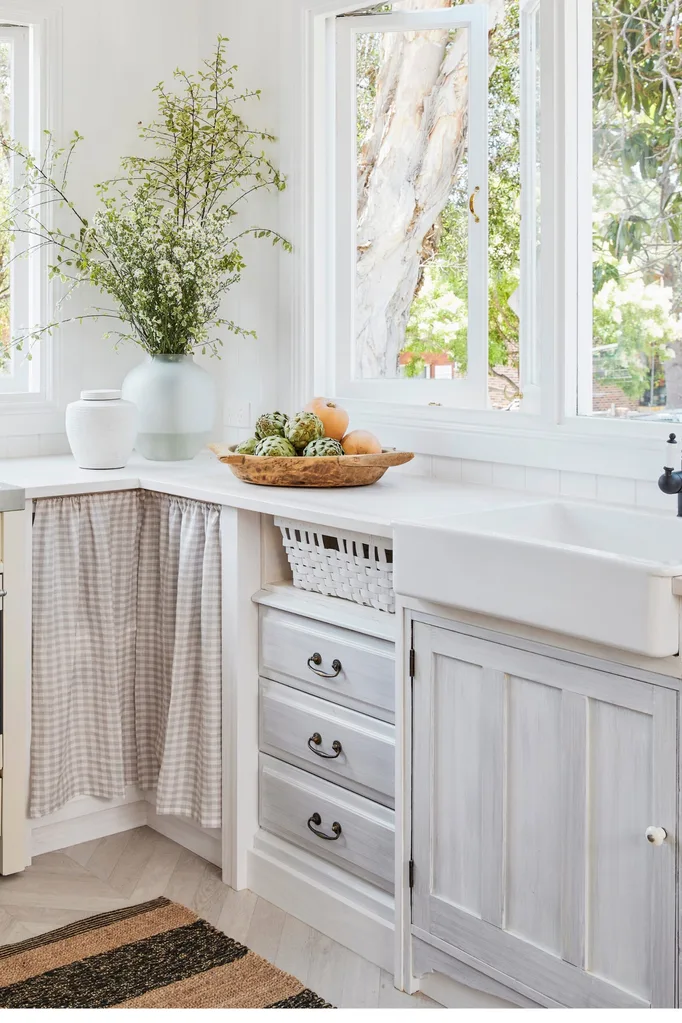 kitchen with curtain cabinet door made of gingham country fabric