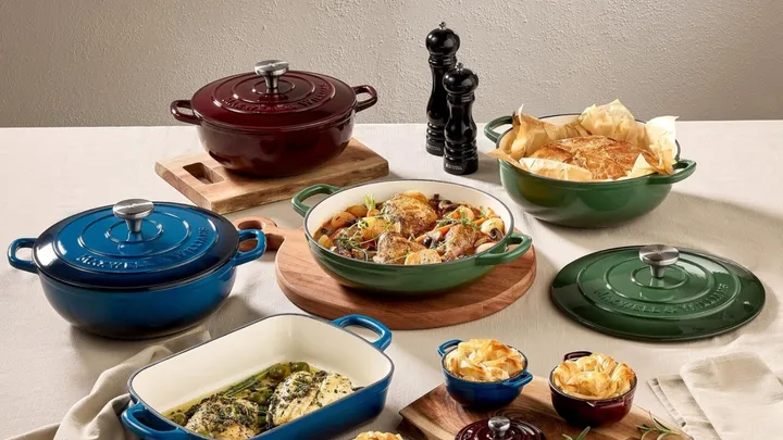 Maxwell and Williams cast iron enamel range on a table
