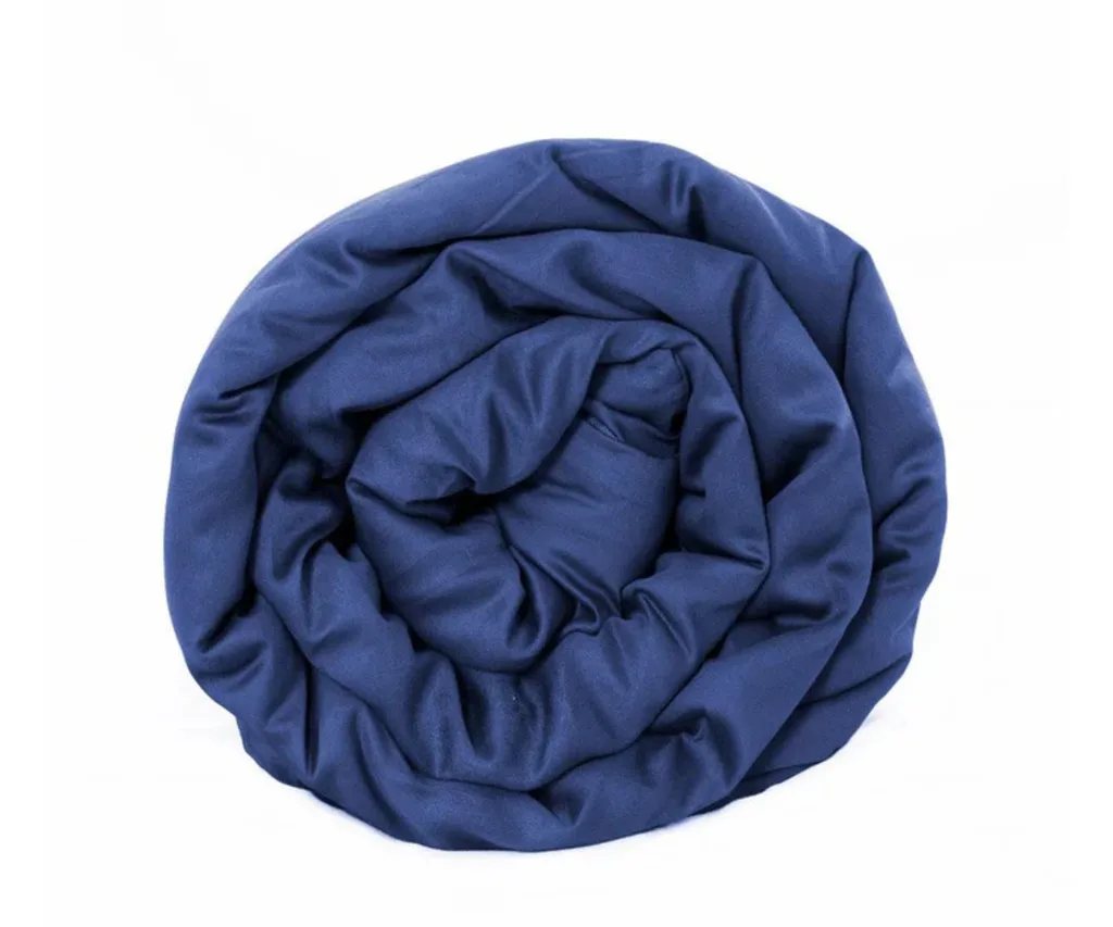 roll of blue weighted blanket from therapy blanket