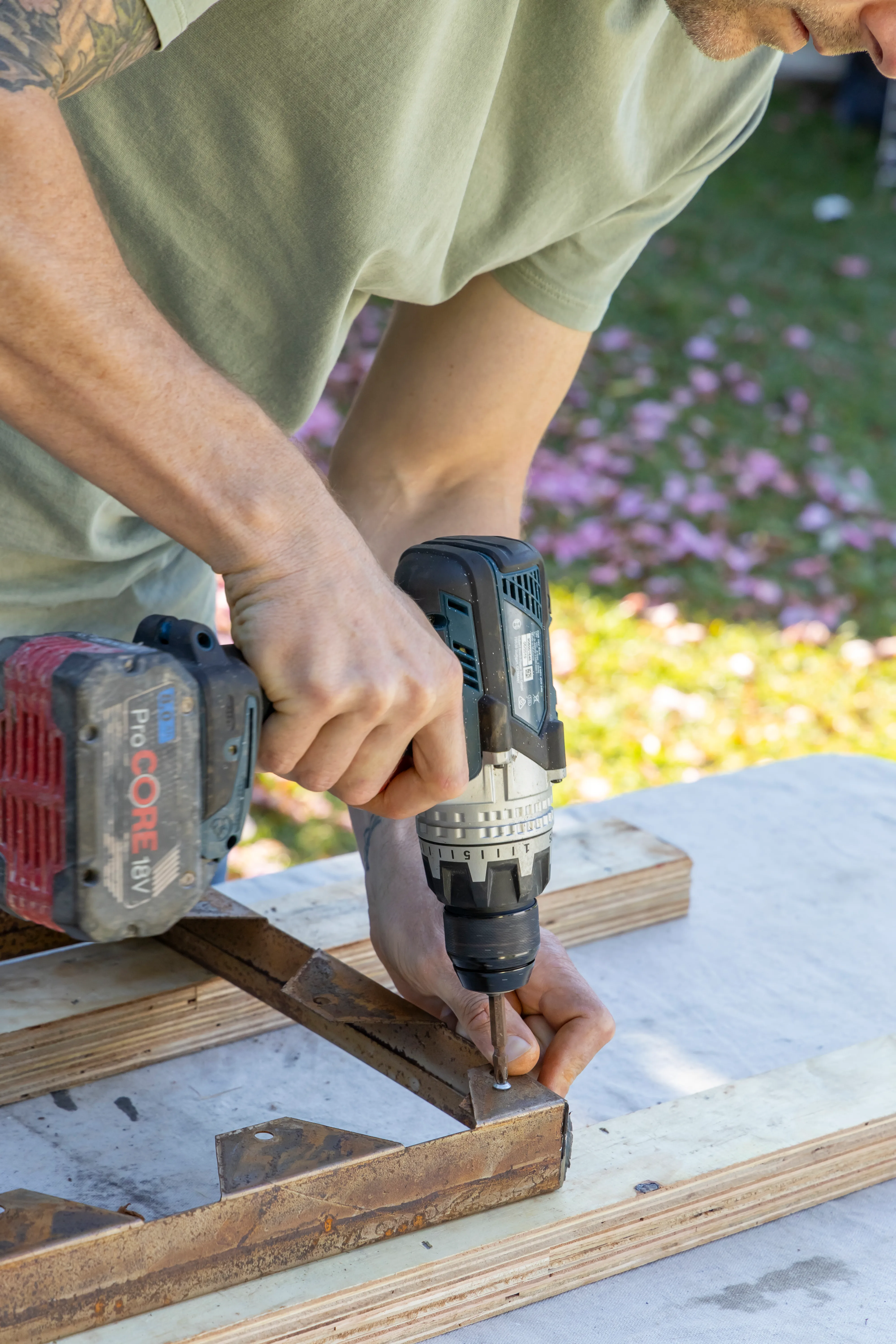 drill drilling onto wood