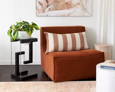 nook corner with armchair pendant light and tensegrity shelf