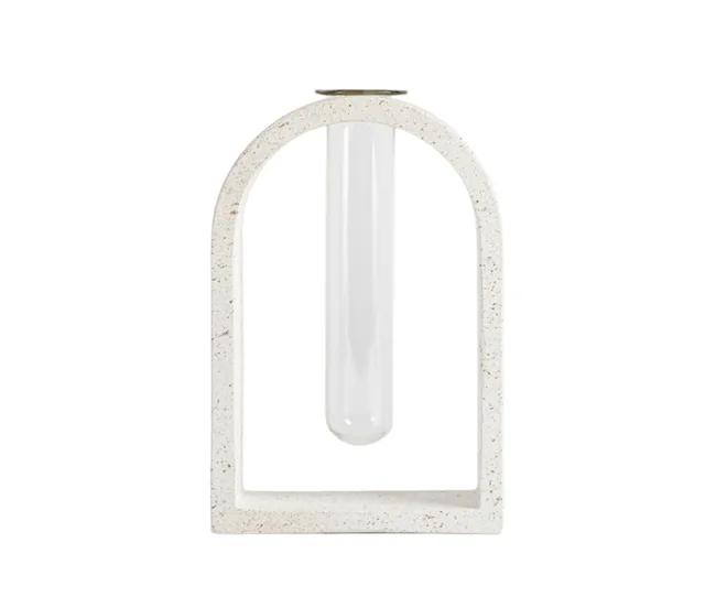 propogattion vase with small test tube being suspended in a plaster vase frame