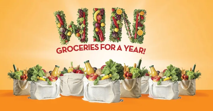 "Text 'Win Groceries for a Year!' with bags of assorted groceries on orange background."