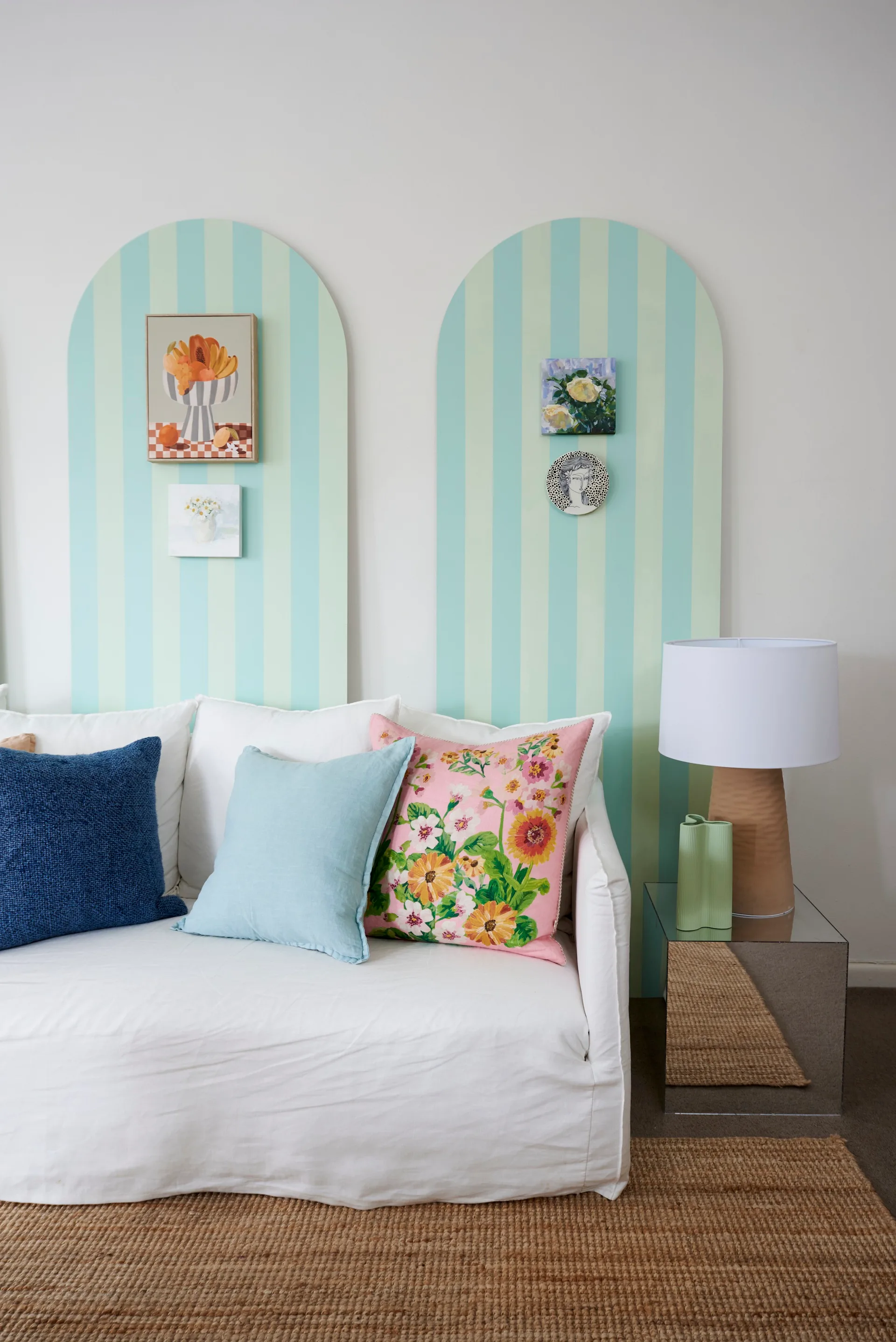 living room with arched blue and green striped wall pannells