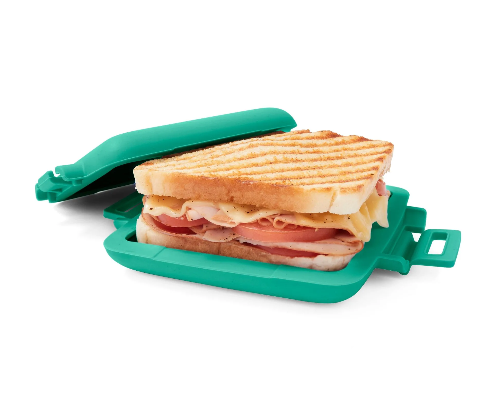 green microwavable toastie maker with a toasted sandwich inside