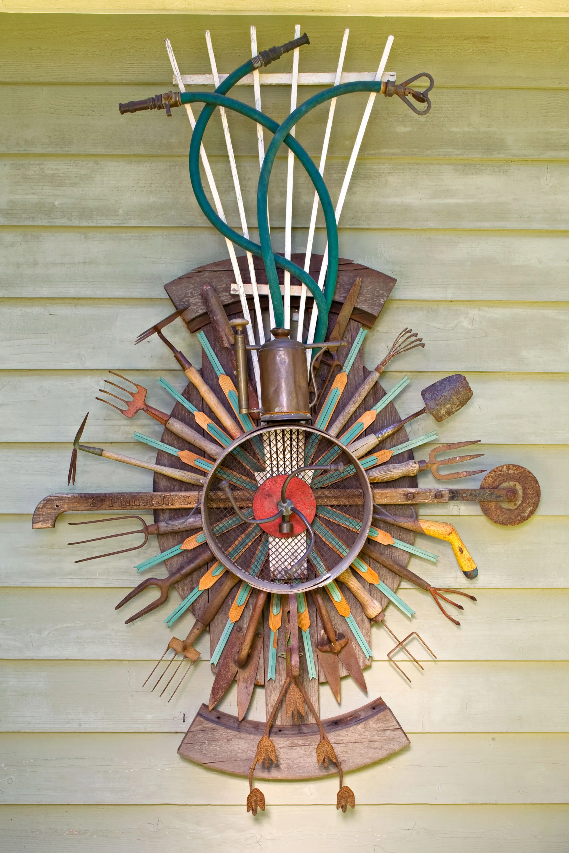 upcycled tools to create a wall artwork