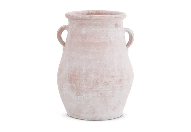 A large, rustic terracotta vase with two handles, featuring a distressed, earthy finish.