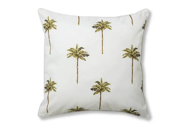 Square pillow with a white background, featuring a pattern of small palm trees.