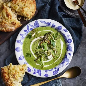 broccoli soup with cheesy mustard scones surrounding it