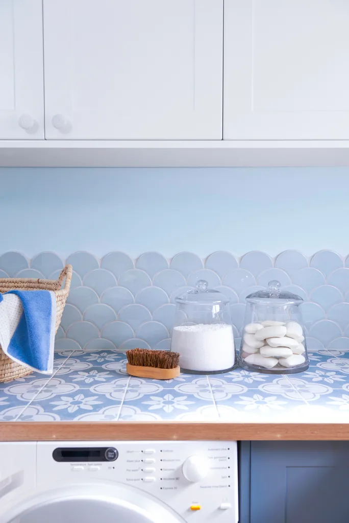 splashback closeup with cupboards and jars of detergent