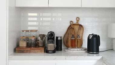 coffee nook with coffee machine, syrups and tea