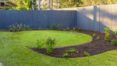 spiral landscaping lawn with garden bed