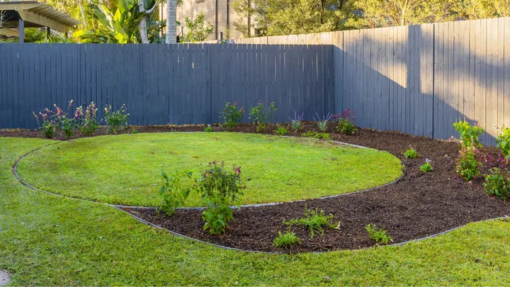 spiral landscaping lawn with garden bed