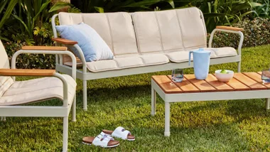 outdoor sitting space with beige cushions