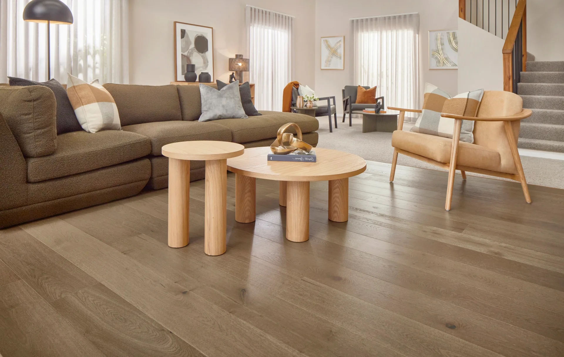 living room with wooden seat and brown couch
