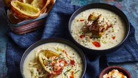 Roasted potato soup with crispy garlic potato