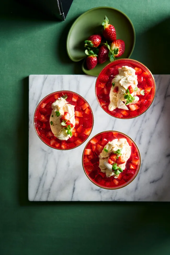 strawberry consomme in three bowls