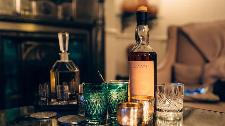 whiskey glasses on table with whiskey
