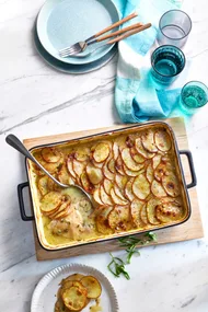 chicken and leek pie with potatoes thinly sliced on top