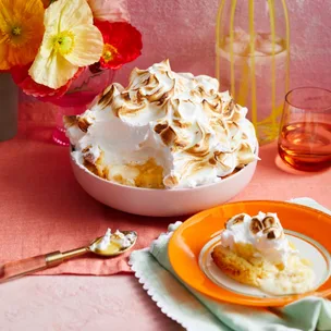 cheat's coconut lemon meringue pie on a brightly coloured table cloth